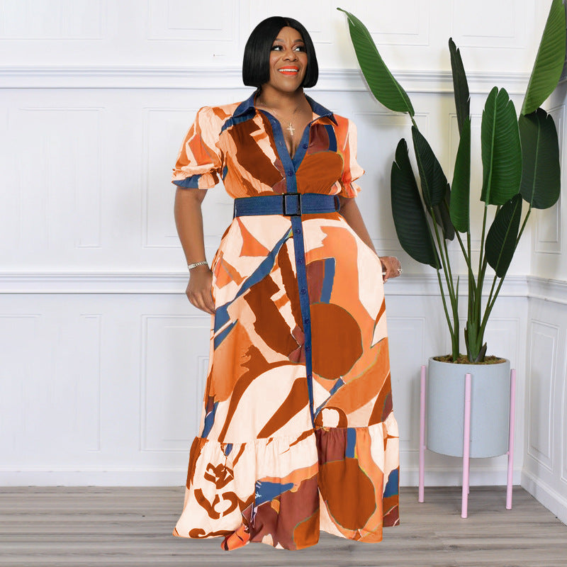Plus size loose summer dress with colorful print and belt by Maryangel Rebel, showcasing a relaxed fit and vibrant design.