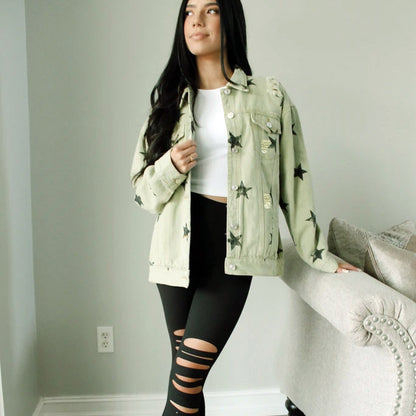Loose-fitting Maryangel Rebel denim jacket for women, featuring a stylish ripped design and classic blue wash.