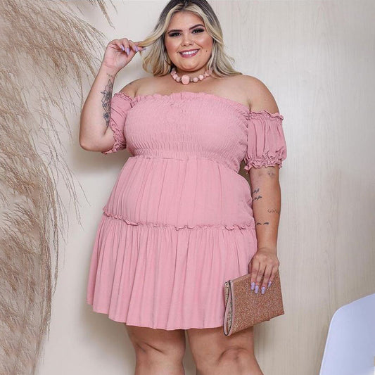 Plus size Maryangel Rebel asymmetric dress showcasing a slimming waist design in a stylish, flowing silhouette.