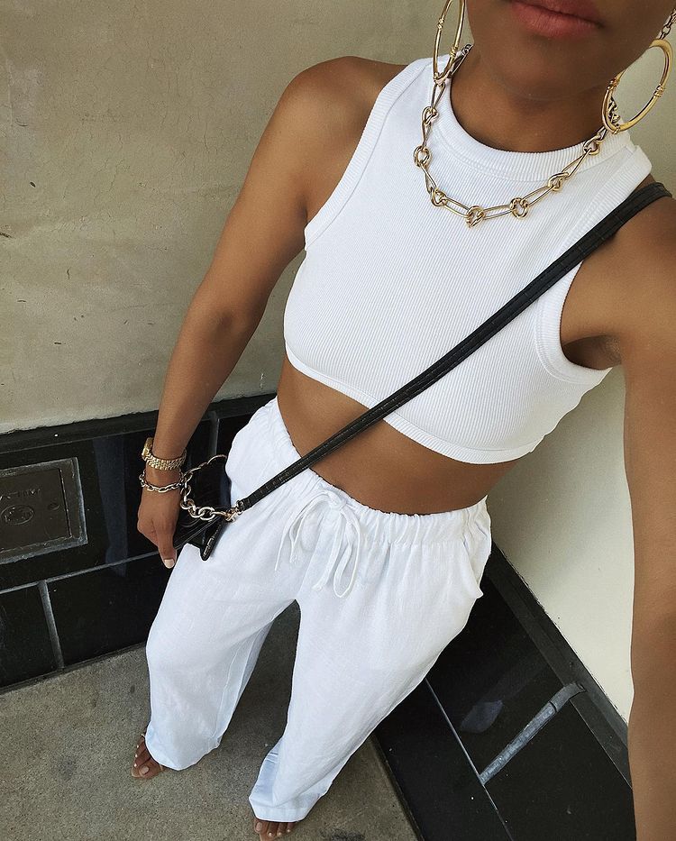 Round neck ribbed sports vest by Maryangel Rebel, cropped fit showcasing a slimming waist and I-shaped design for summer style.