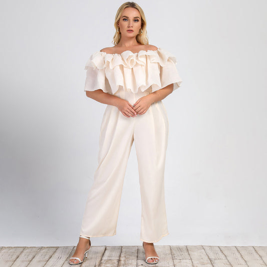 Plus size women's off-shoulder jumpsuit in solid color with lotus edge and straight-leg design by Maryangel Rebel.