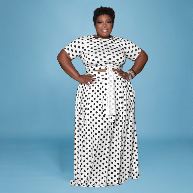 Plus size polka dot two-piece suit by Maryangel Rebel, featuring a casual top and matching pants in a stylish design.