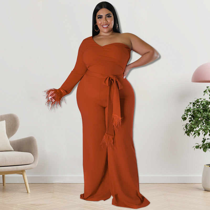 Plus size Maryangel Rebel asymmetric jumpsuit in a stylish design, featuring a flattering silhouette and comfortable fit.