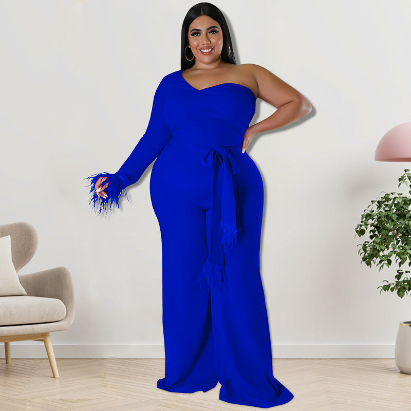 Plus size Maryangel Rebel asymmetric jumpsuit in black with a stylish draped design and wide leg silhouette.