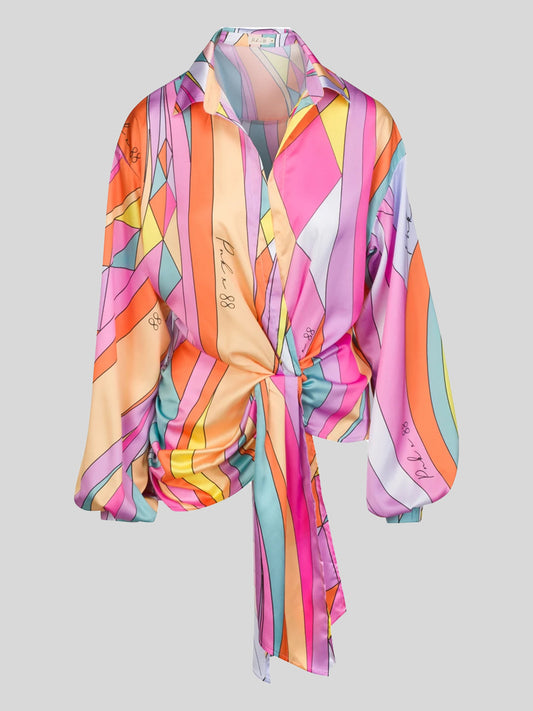 Plus size loose long sleeve printed shirt top by Maryangel Rebel featuring a vibrant floral design and relaxed fit.